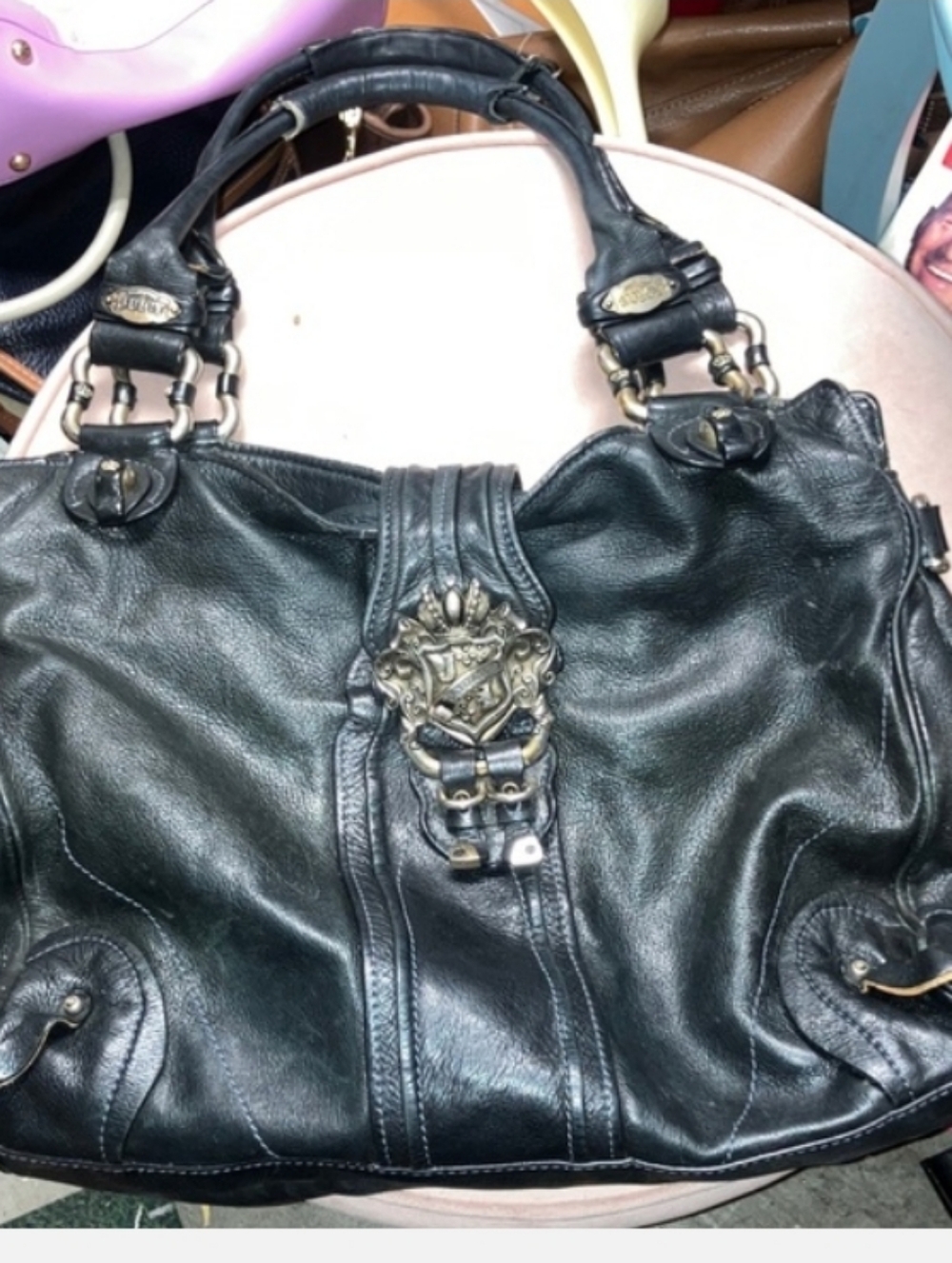 JuicY Couturelack Leather Shoulder Bag with Ornate Metal Accent